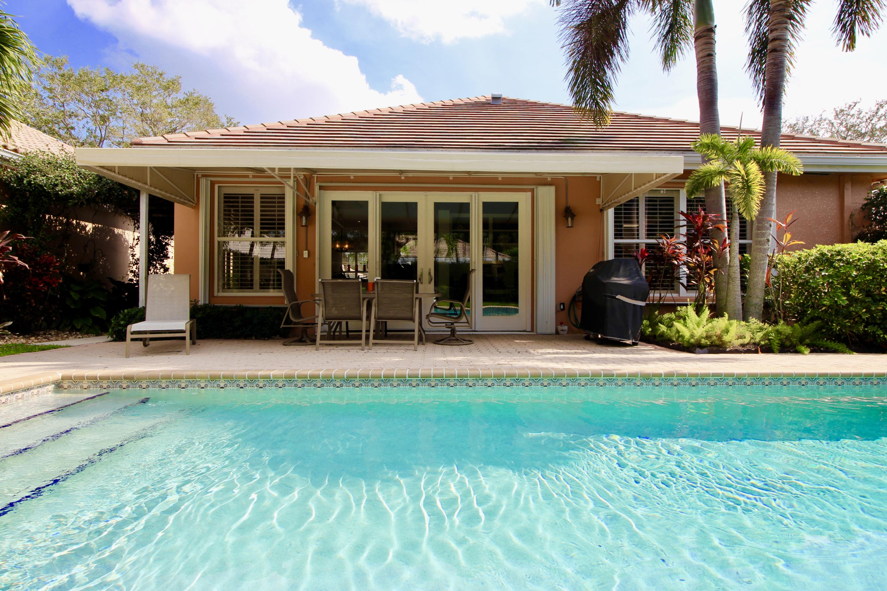 127 Hampton Circle Jupiter, FL 33458 - Photo 24 of 31 Covered Patio