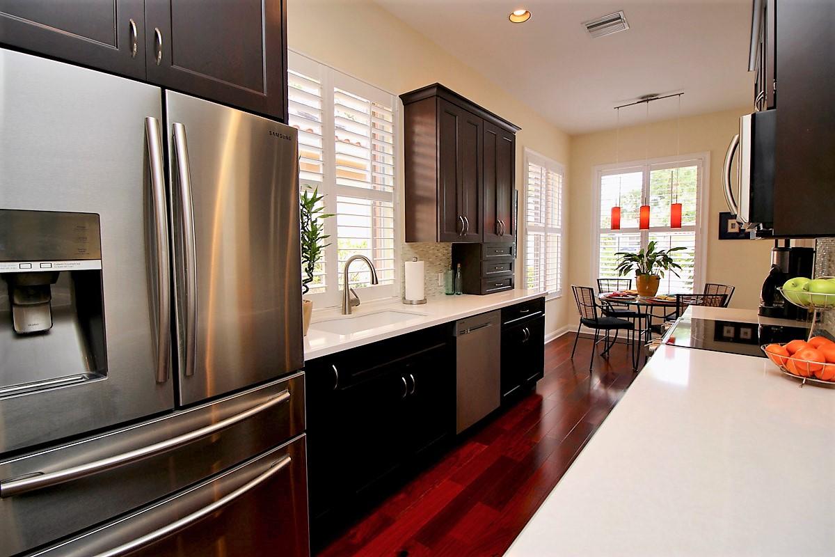 127 Hampton Circle Jupiter, FL 33458 - Photo 7 of 31 Sunny Kitchen with Quartz Counter Top