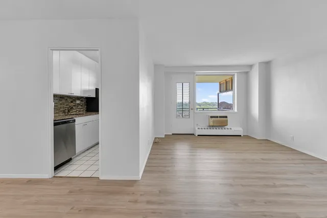 a view of kitchen with wooden floor