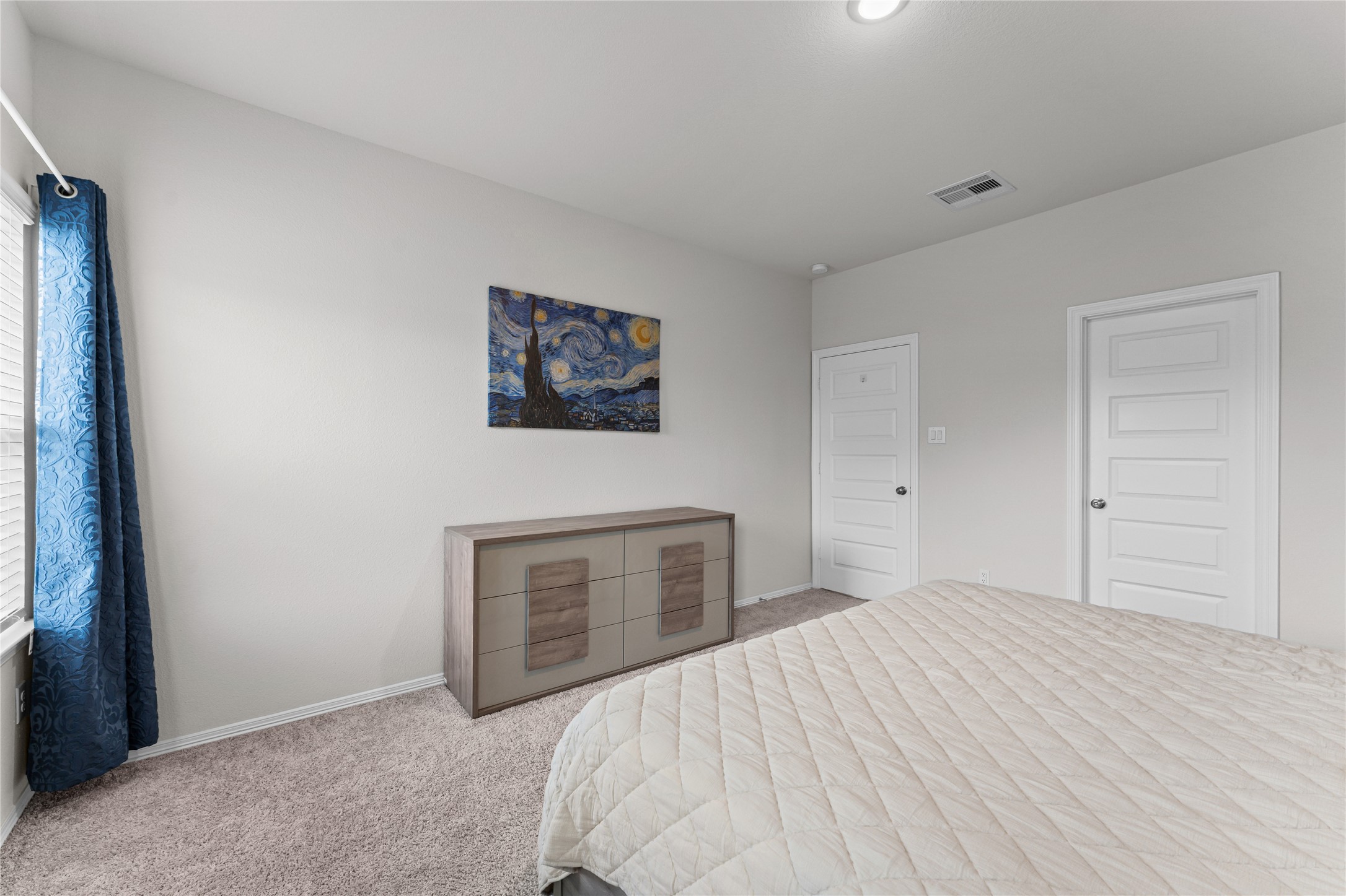 23326 Spring Genesis Lane Katy, TX 77493 - Photo 14 of 32 a bedroom with a bed and a fireplace