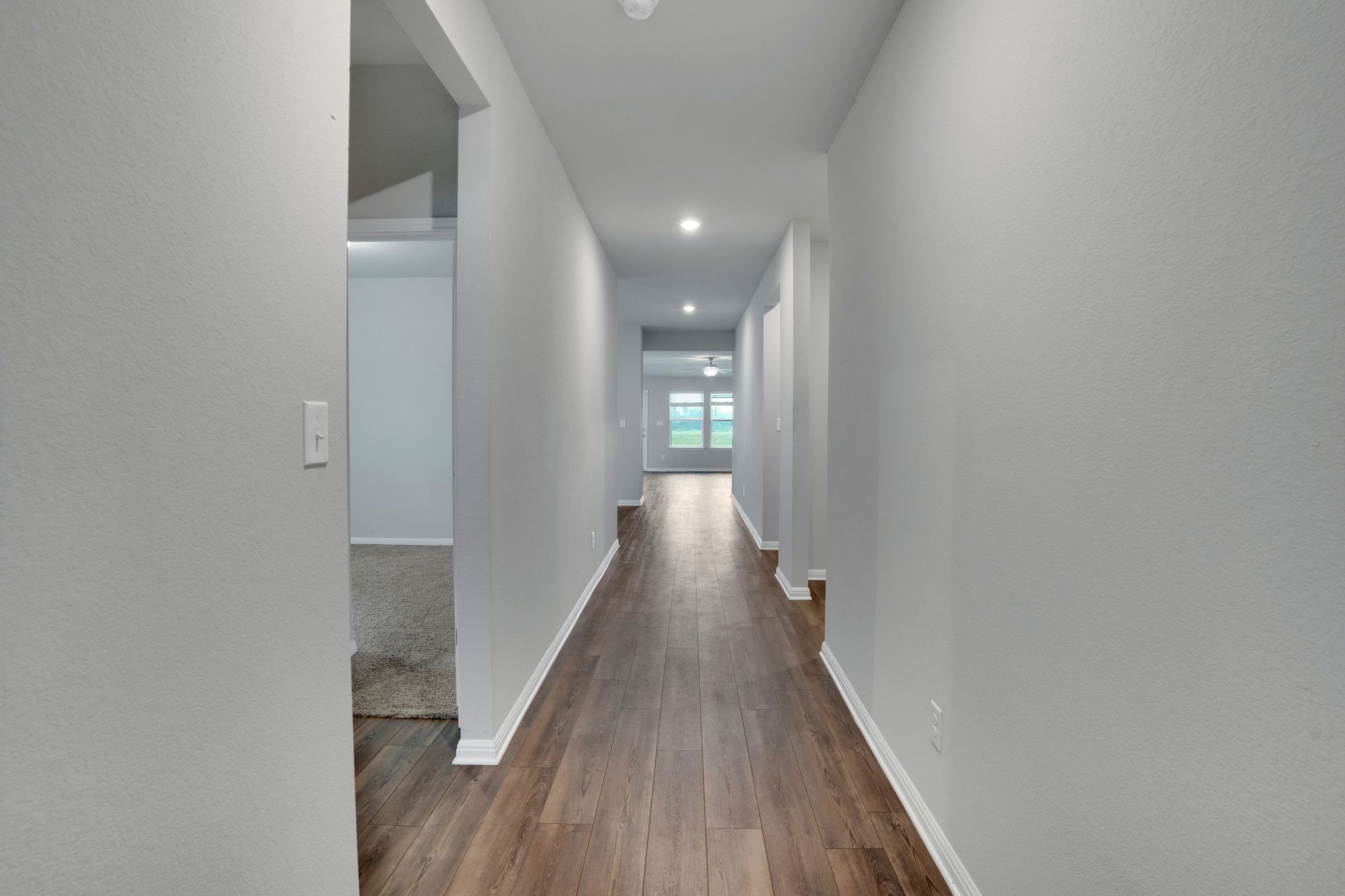 518 Windy Reed Road Hutto, TX 78634 - Photo 7 of 30 Front entry area is well designed offering plenty of space between the front bedrooms and the main living area.