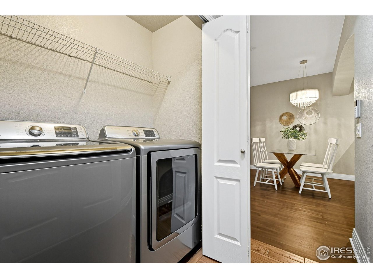 159 Quebec Street, Unit D Denver, CO 80220 - Photo 44 of 49 a view of kitchen and dining room with wooden floor