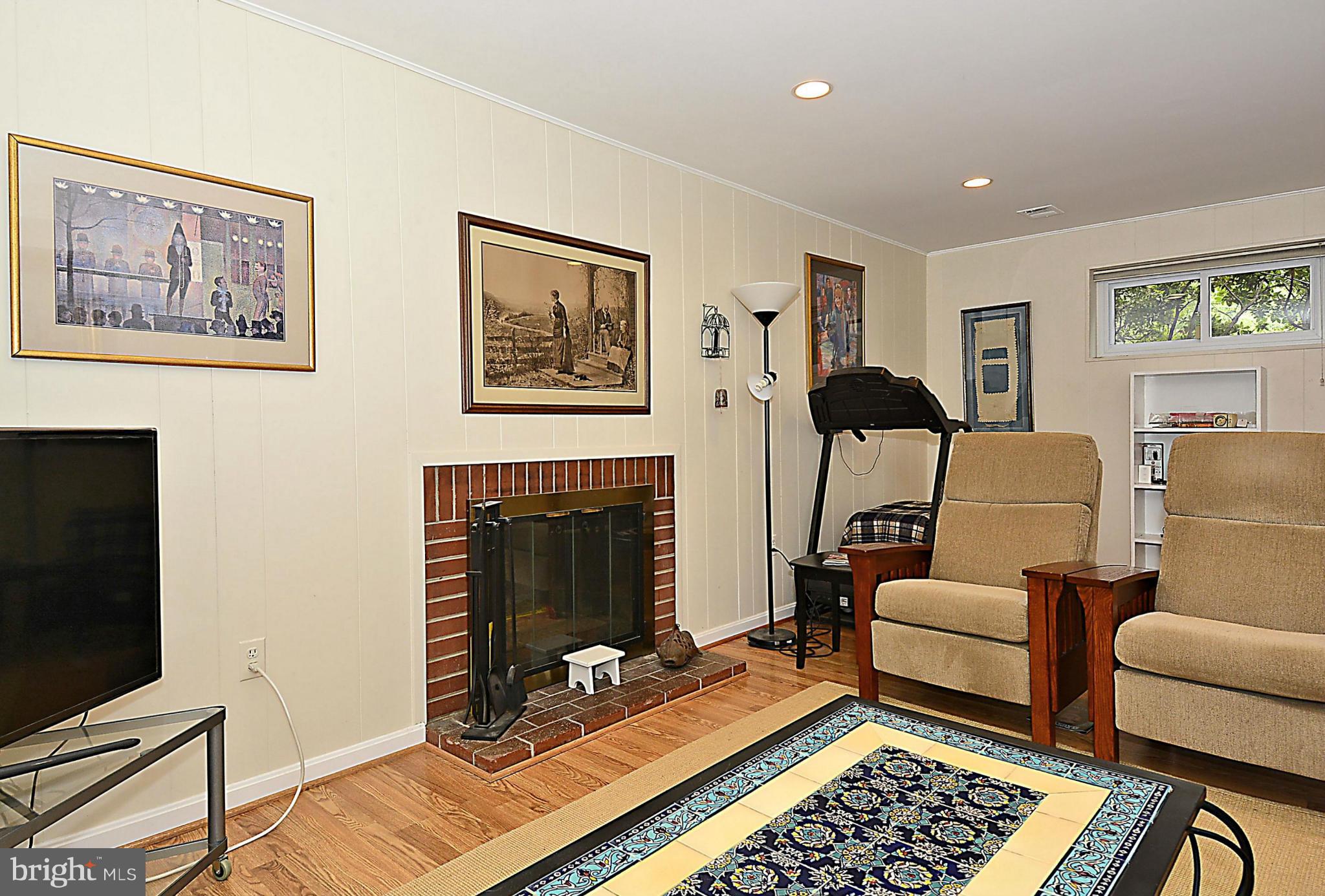 11520 Lovejoy Street Silver Spring, MD 20902 - Photo 23 of 30 Family Room Fireplace