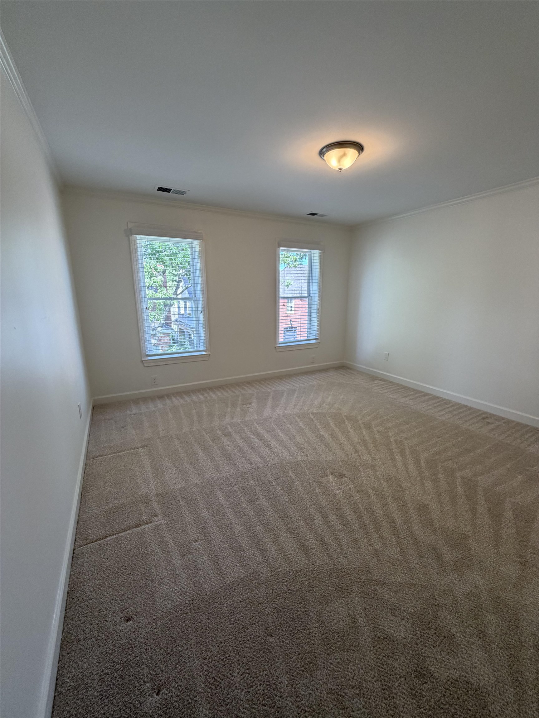 147 Greeff Lane Memphis, TN 38111 - Photo 19 of 23 an empty room with windows