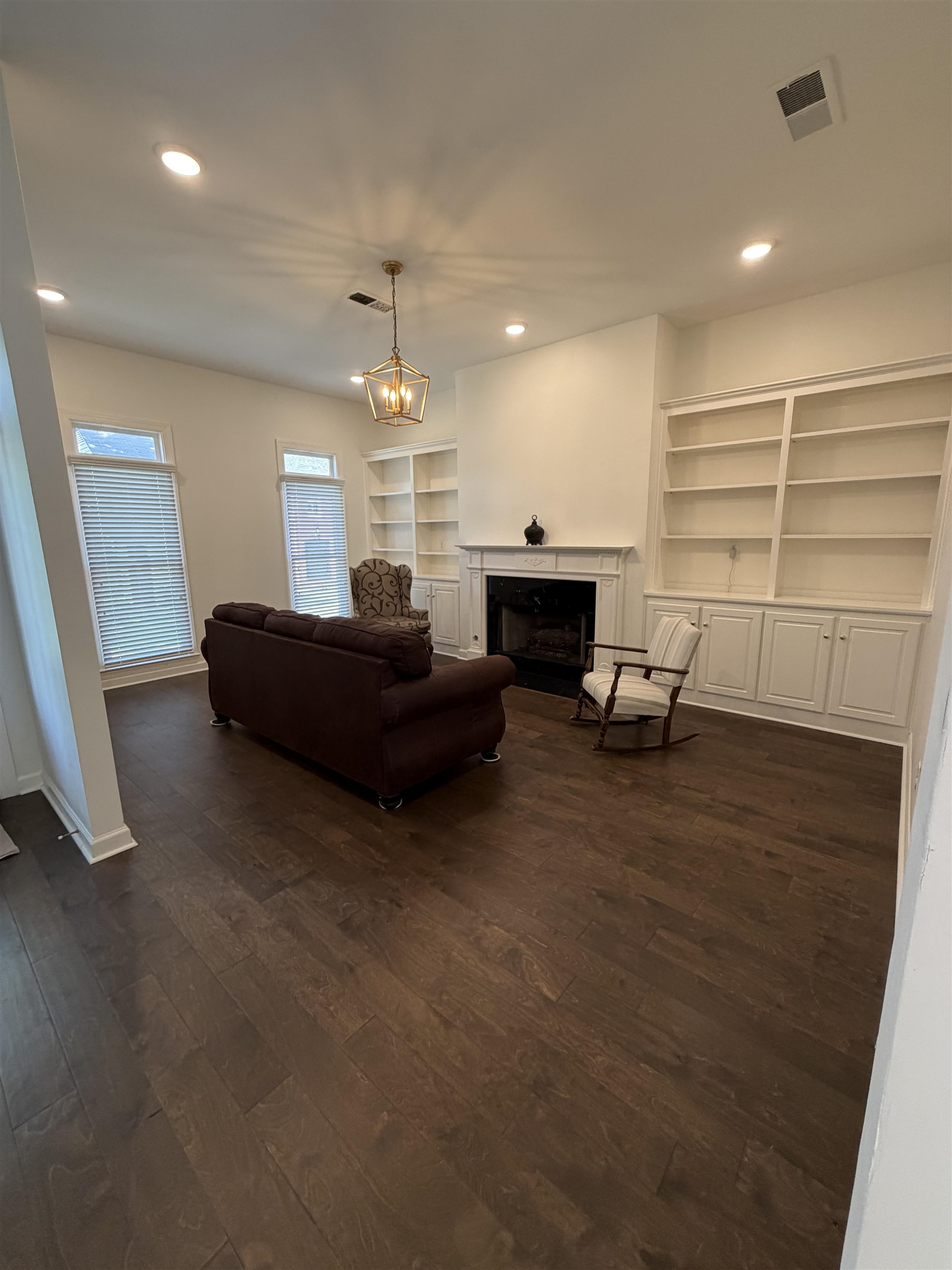 147 Greeff Lane Memphis, TN 38111 - Photo 9 of 23 a living room with furniture and a fireplace
