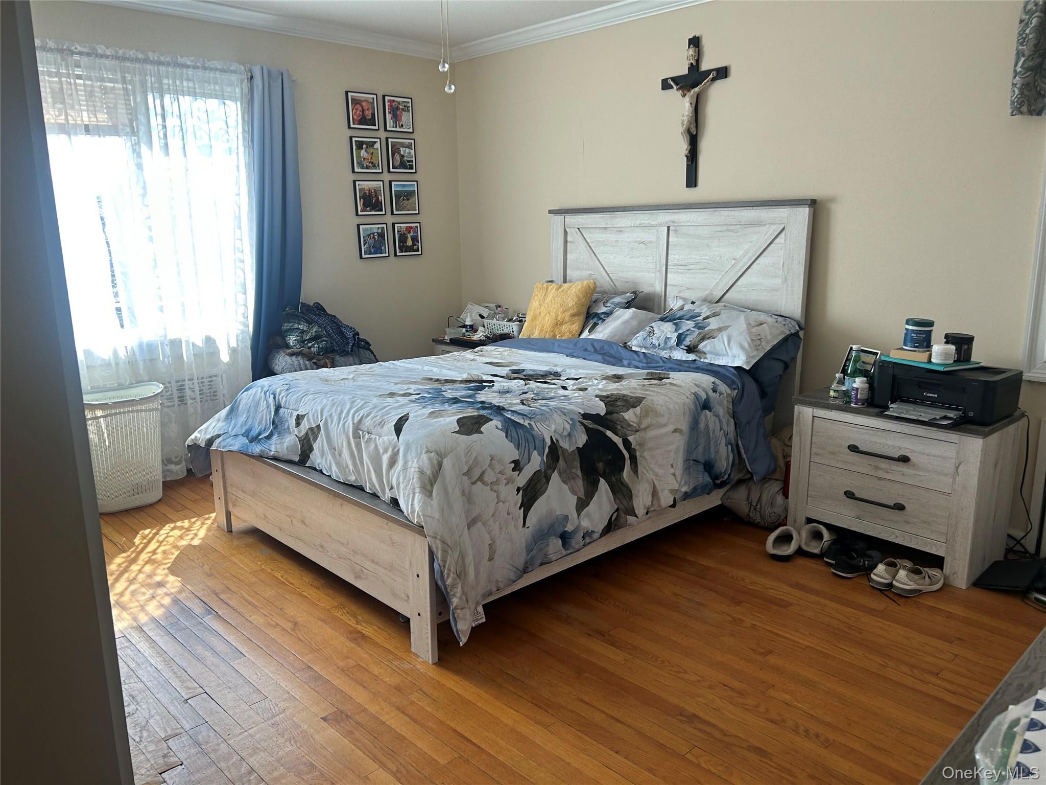 57 Woodruff Avenue Bronxville, NY 10708 - Photo 3 of 6 a bedroom with a bed and dresser