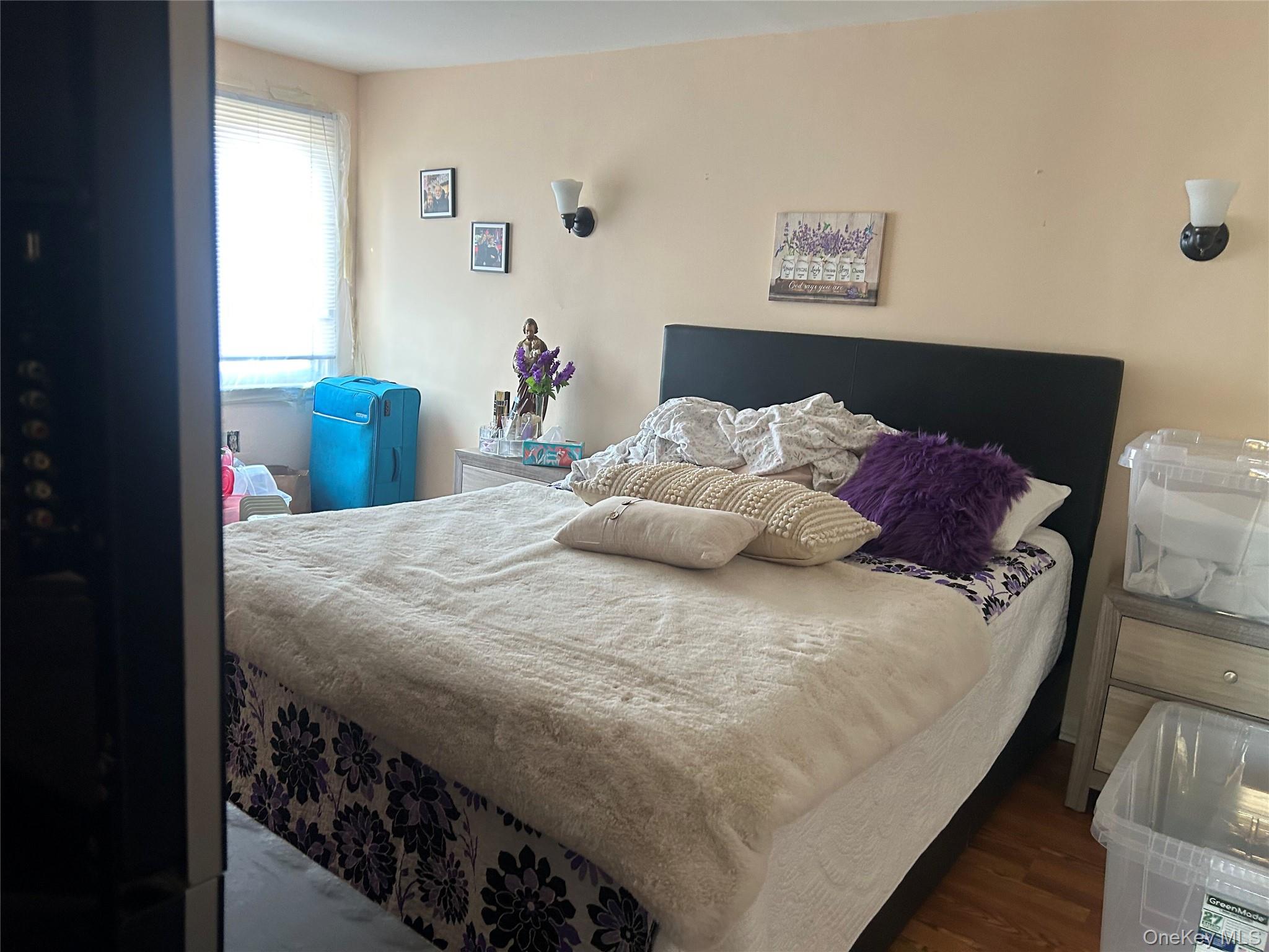 57 Woodruff Avenue Bronxville, NY 10708 - Photo 4 of 6 a bedroom with a bed and window