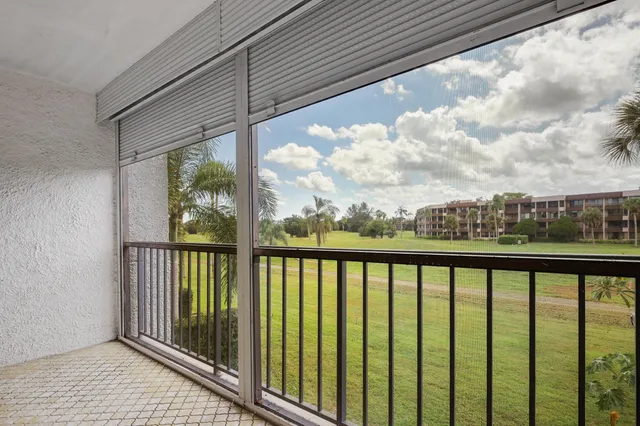 a view of a balcony with city view