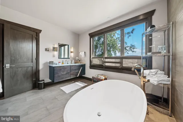 a view of swimming pool with a yard and sitting area