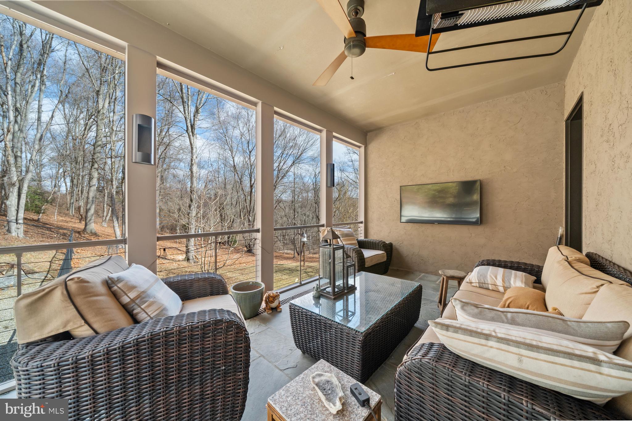 3924 Thompsons Bridge Road Wilmington, DE 19807 - Photo 26 of 78 a living room with furniture and a floor to ceiling window