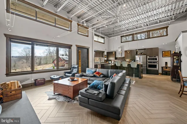 a view of a kitchen with furniture and a kitchen
