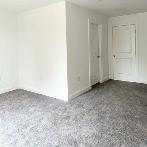 an empty room with an entryway