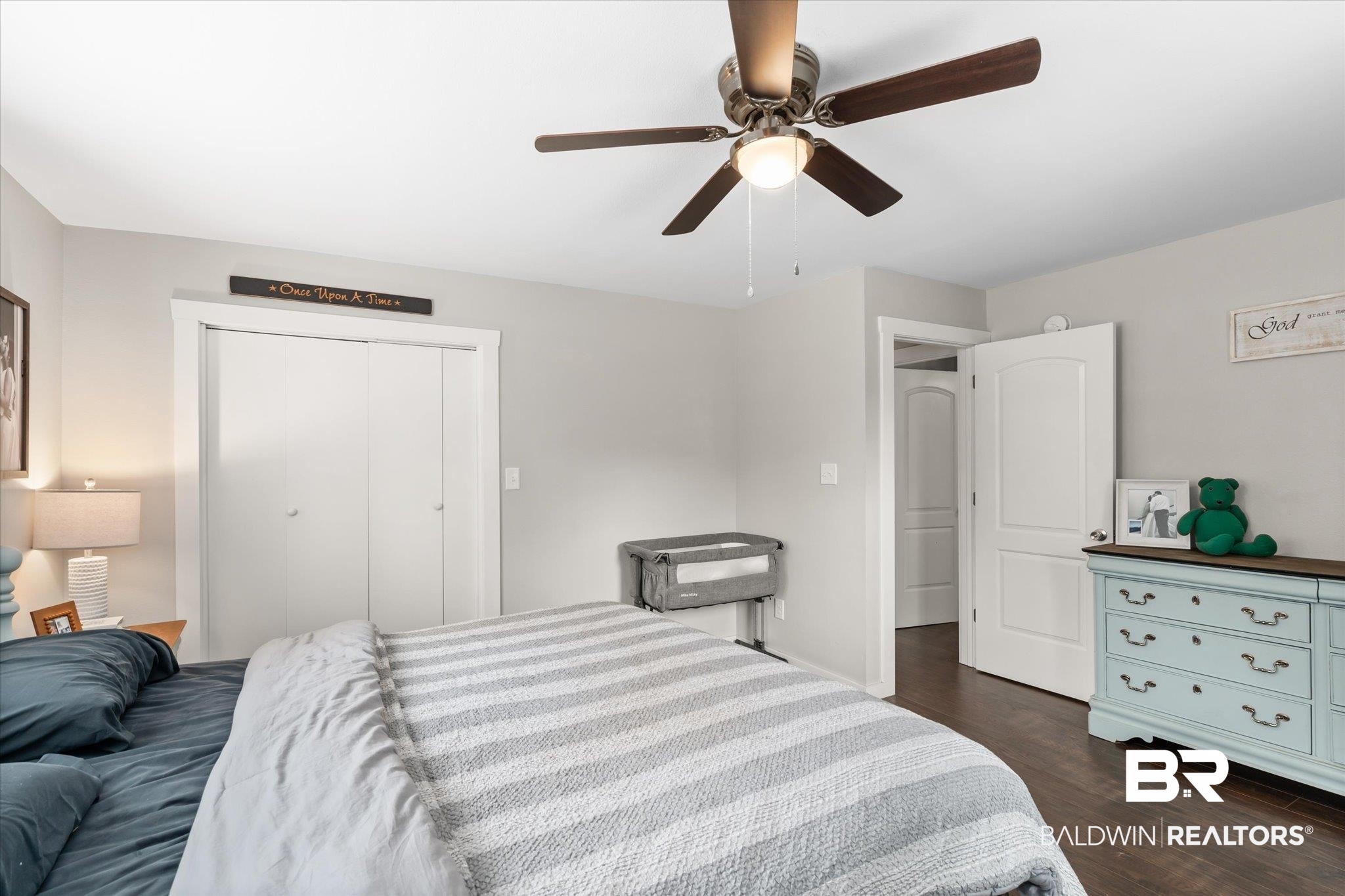 419 Pierce Street Saraland, AL 36571 - Photo 10 of 21 Bedroom featuring ceiling fan, dark hardwood / wood-style floors, and a closet