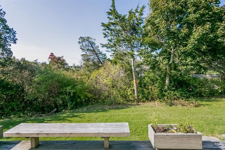 18 Cedar Land Road Orleans, MA 02653 - Photo 23 of 27 a view of a yard with an outdoor space