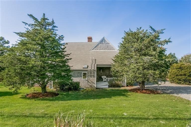 18 Cedar Land Road Orleans, MA 02653 - Photo 3 of 27 a view of a house with a backyard