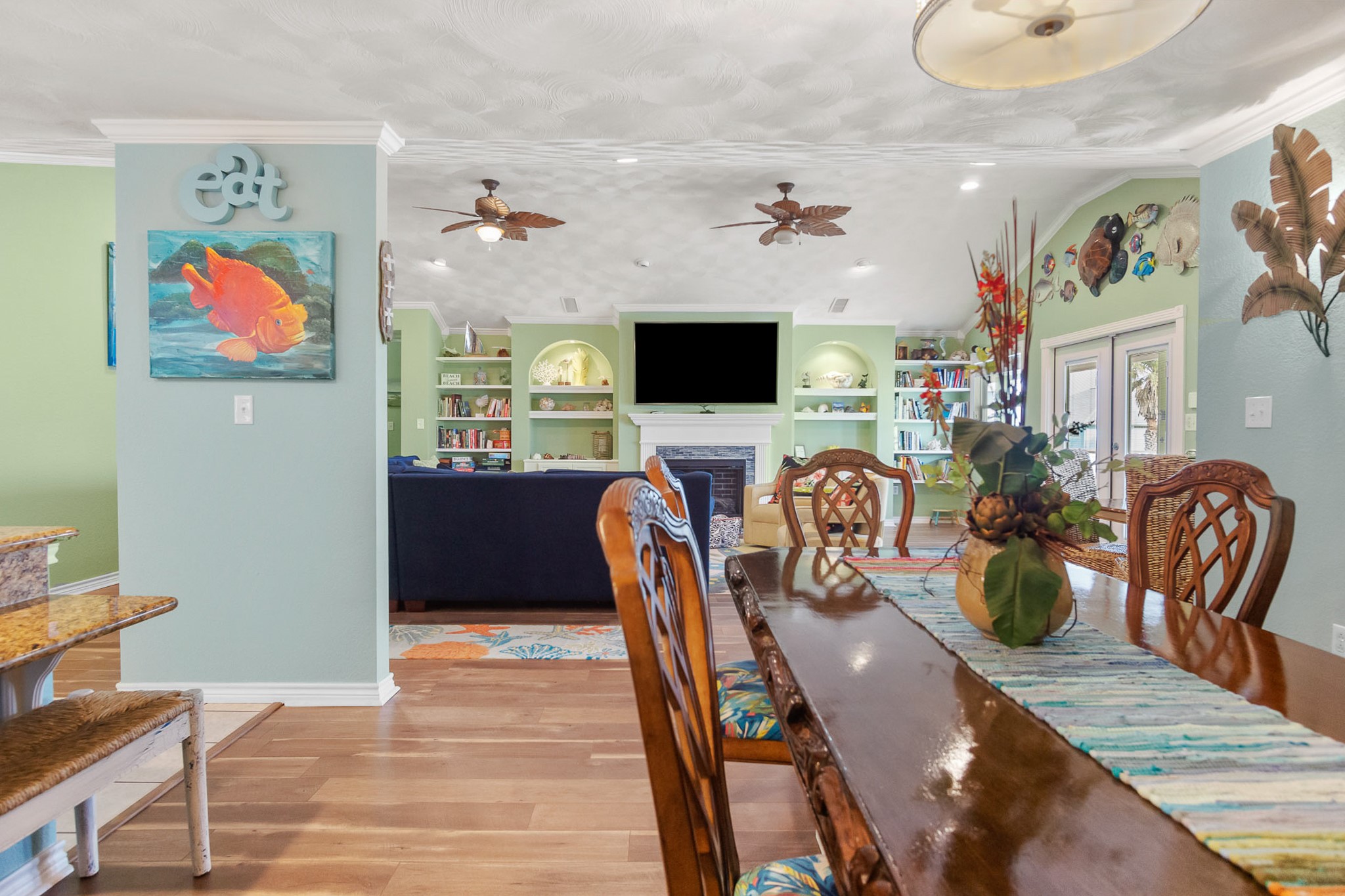 3297 Prides Way Crystal Beach, TX 77650 - Photo 12 of 42 a view of a livingroom with furniture and a flat screen tv