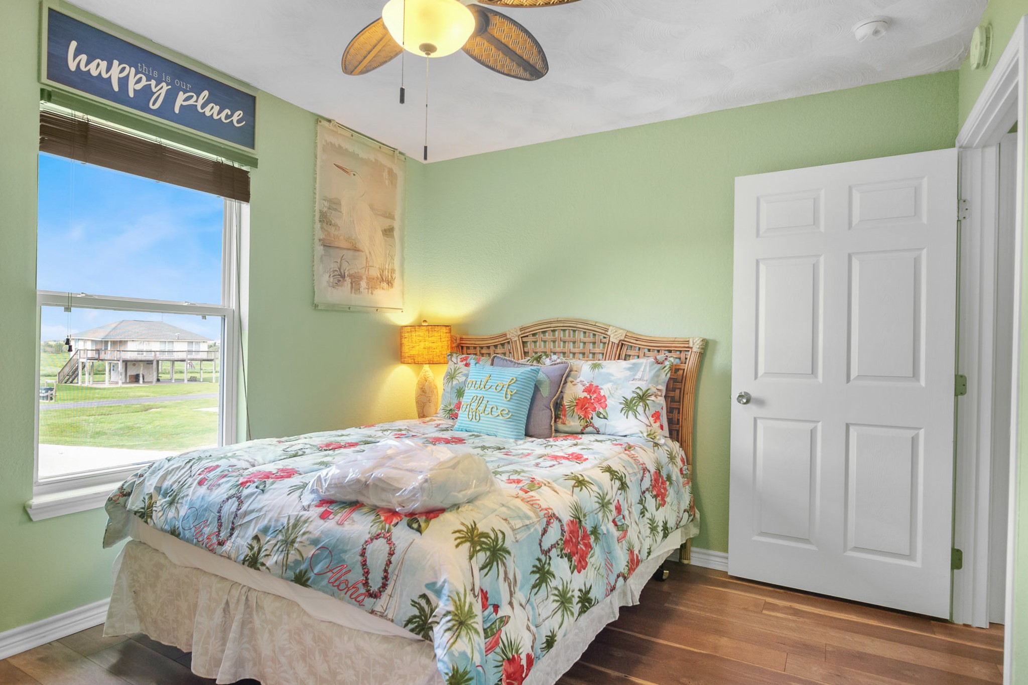 3297 Prides Way Crystal Beach, TX 77650 - Photo 20 of 42 a bedroom with a bed and a window
