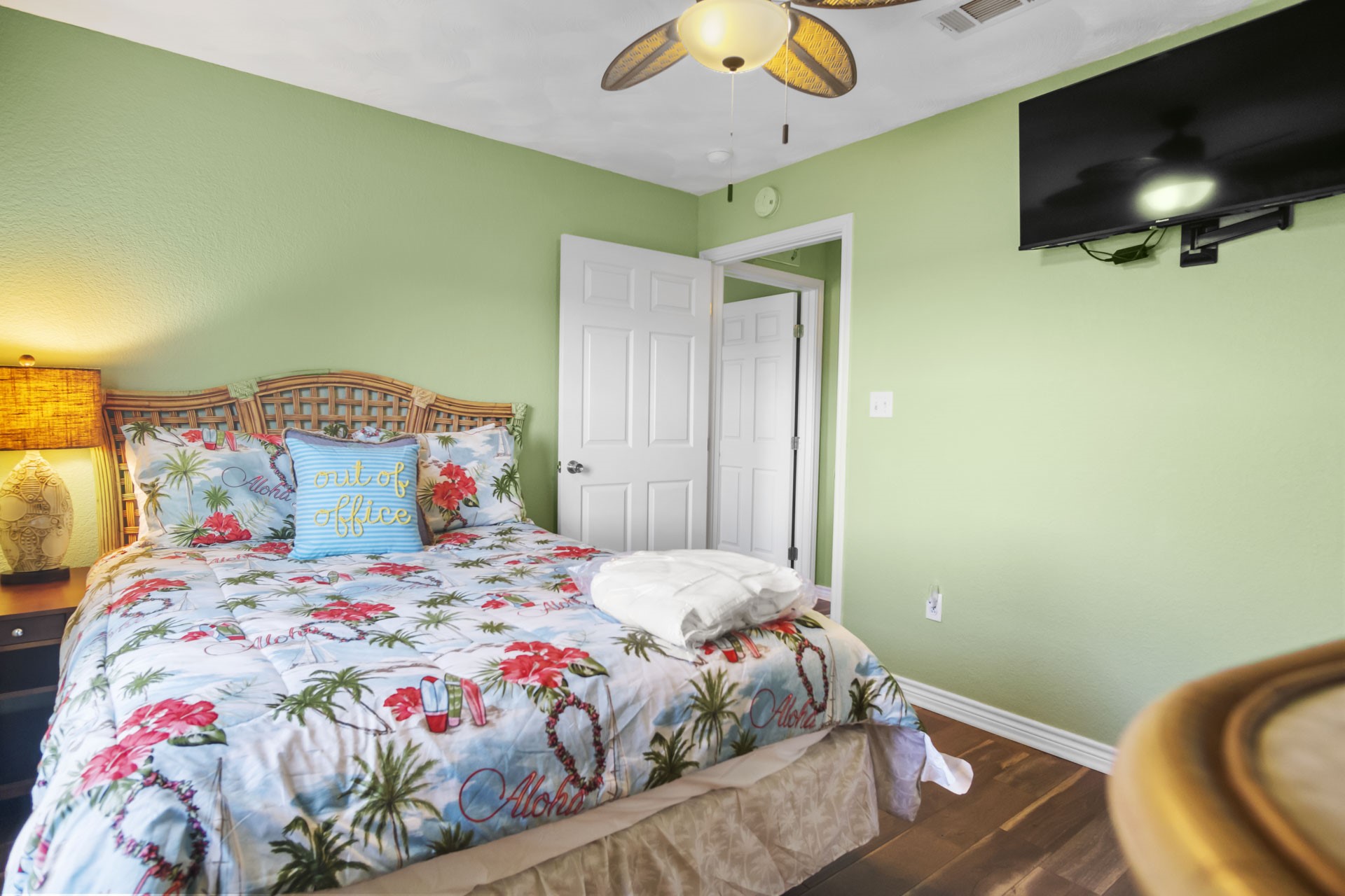3297 Prides Way Crystal Beach, TX 77650 - Photo 21 of 42 a bedroom with a bed and flat screen tv