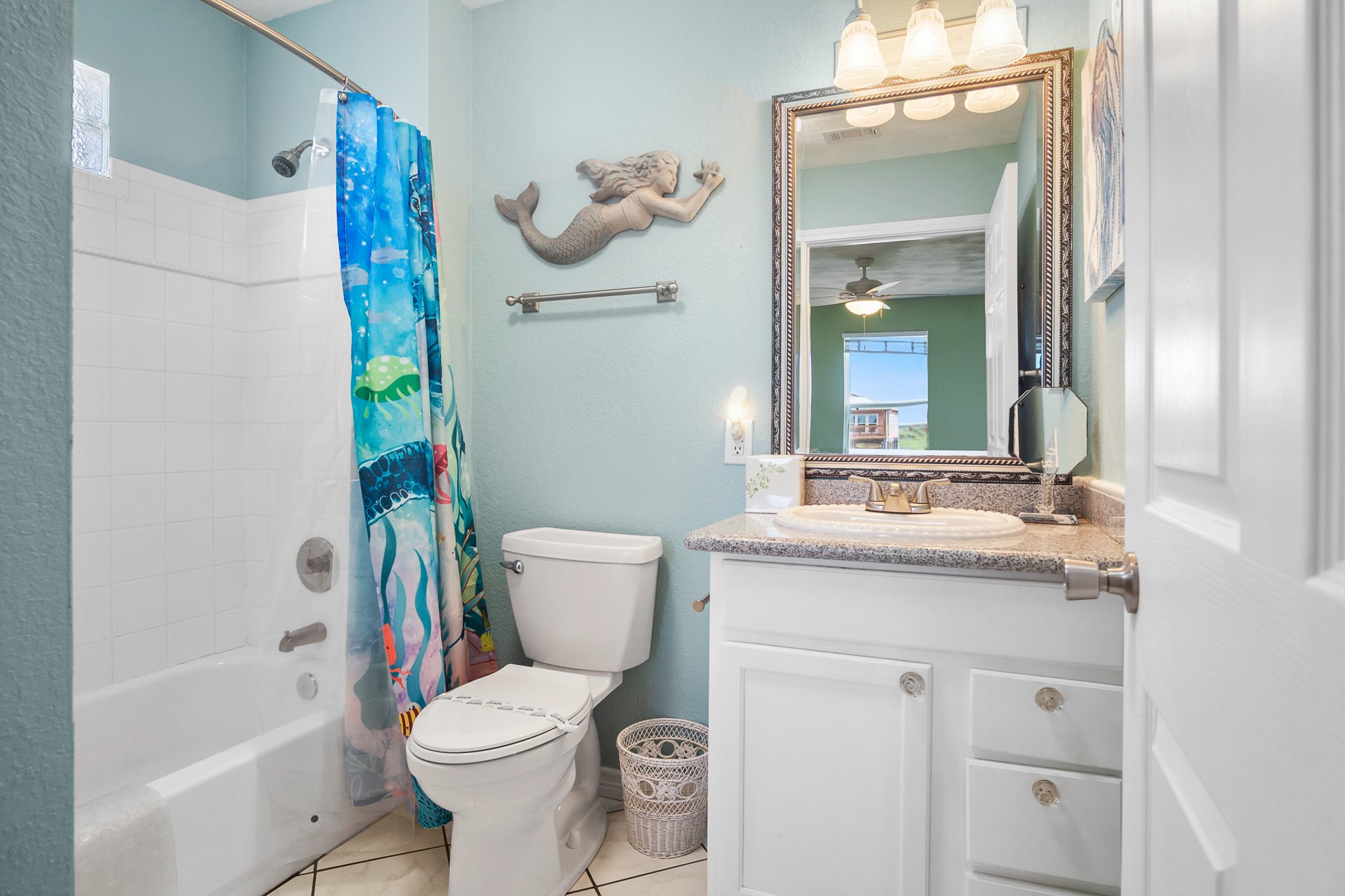 3297 Prides Way Crystal Beach, TX 77650 - Photo 25 of 42 a bathroom with a sink toilet and shower