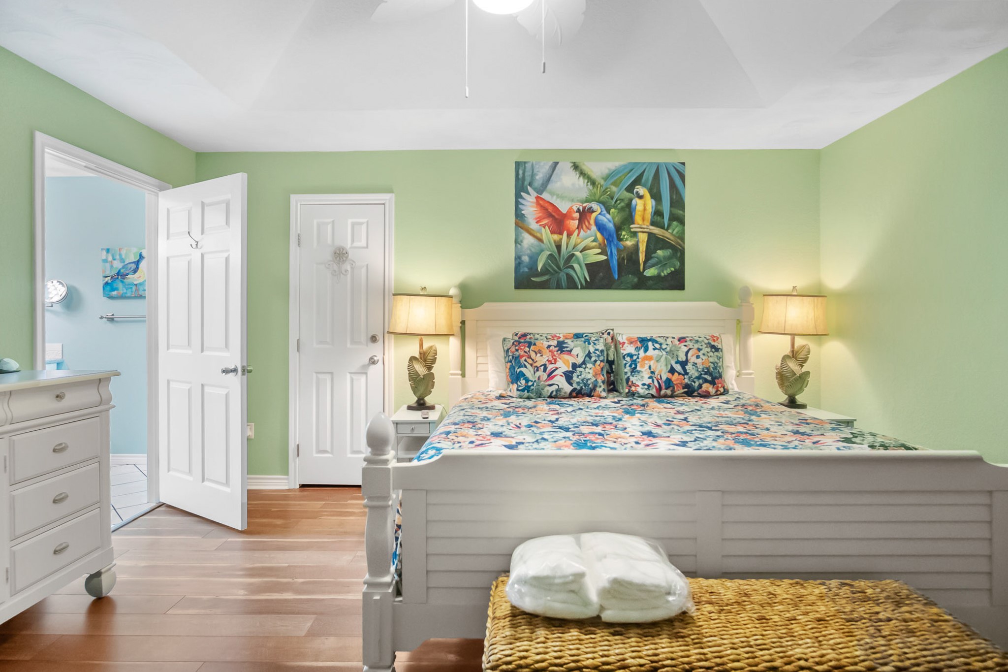 3297 Prides Way Crystal Beach, TX 77650 - Photo 29 of 42 a bedroom with a bed and painting on the wall