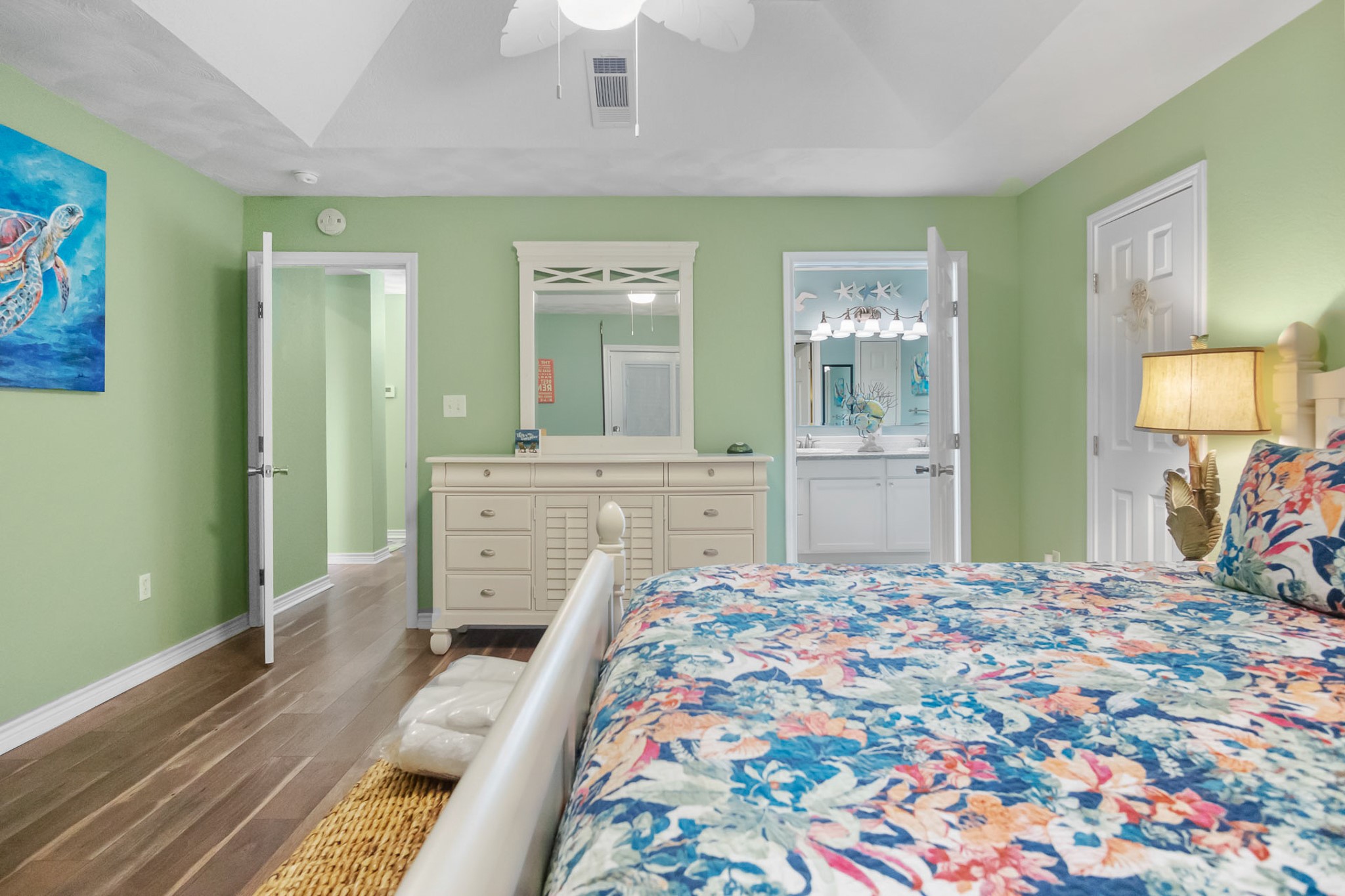 3297 Prides Way Crystal Beach, TX 77650 - Photo 30 of 42 a bedroom with a bed and a dresser in it