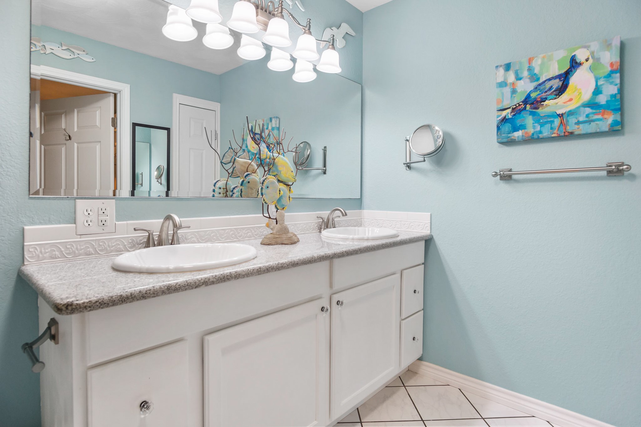 3297 Prides Way Crystal Beach, TX 77650 - Photo 33 of 42 a bathroom with a granite countertop sink a large mirror and vanity