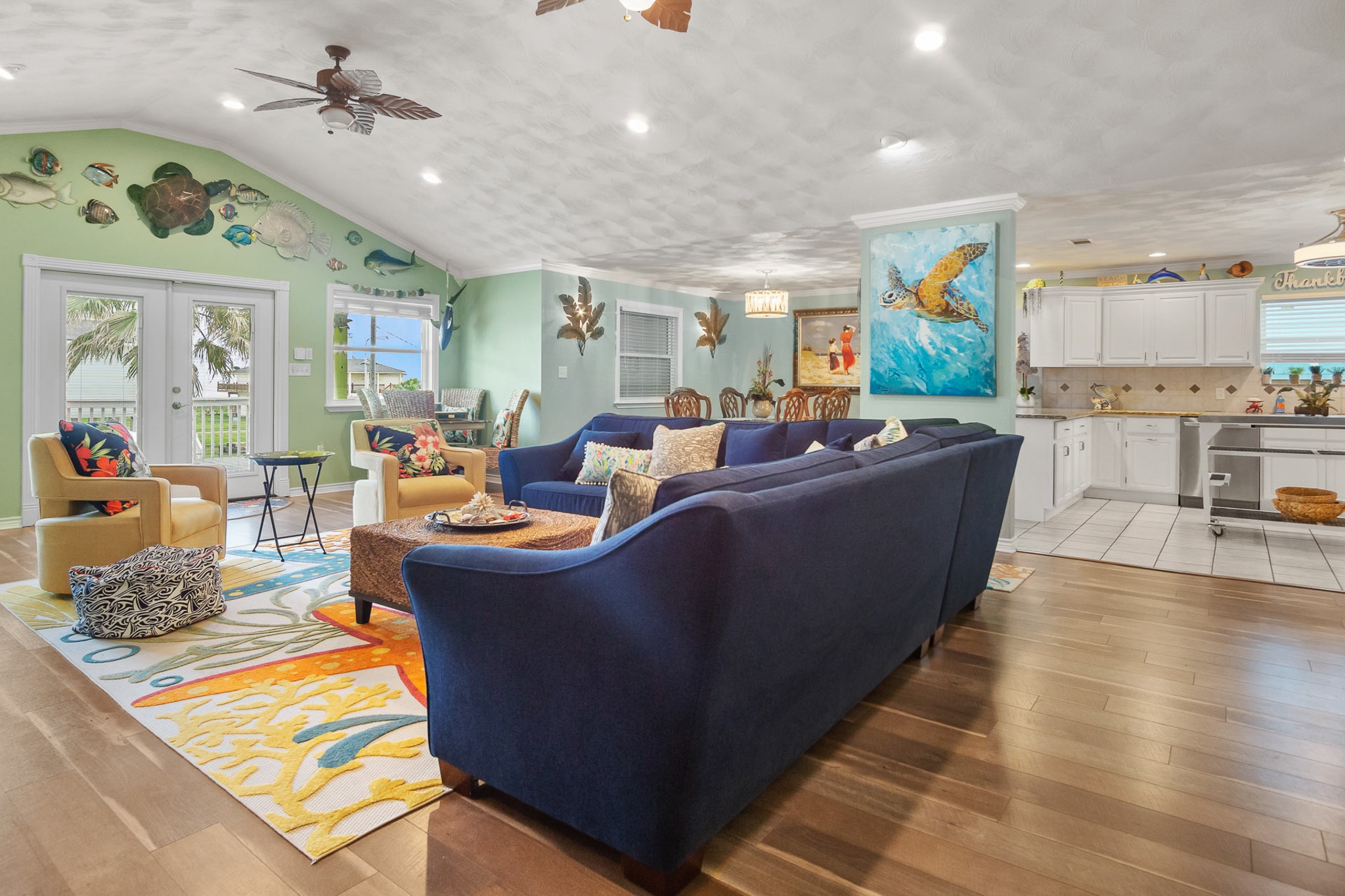 3297 Prides Way Crystal Beach, TX 77650 - Photo 7 of 42 a living room with furniture and a chandelier