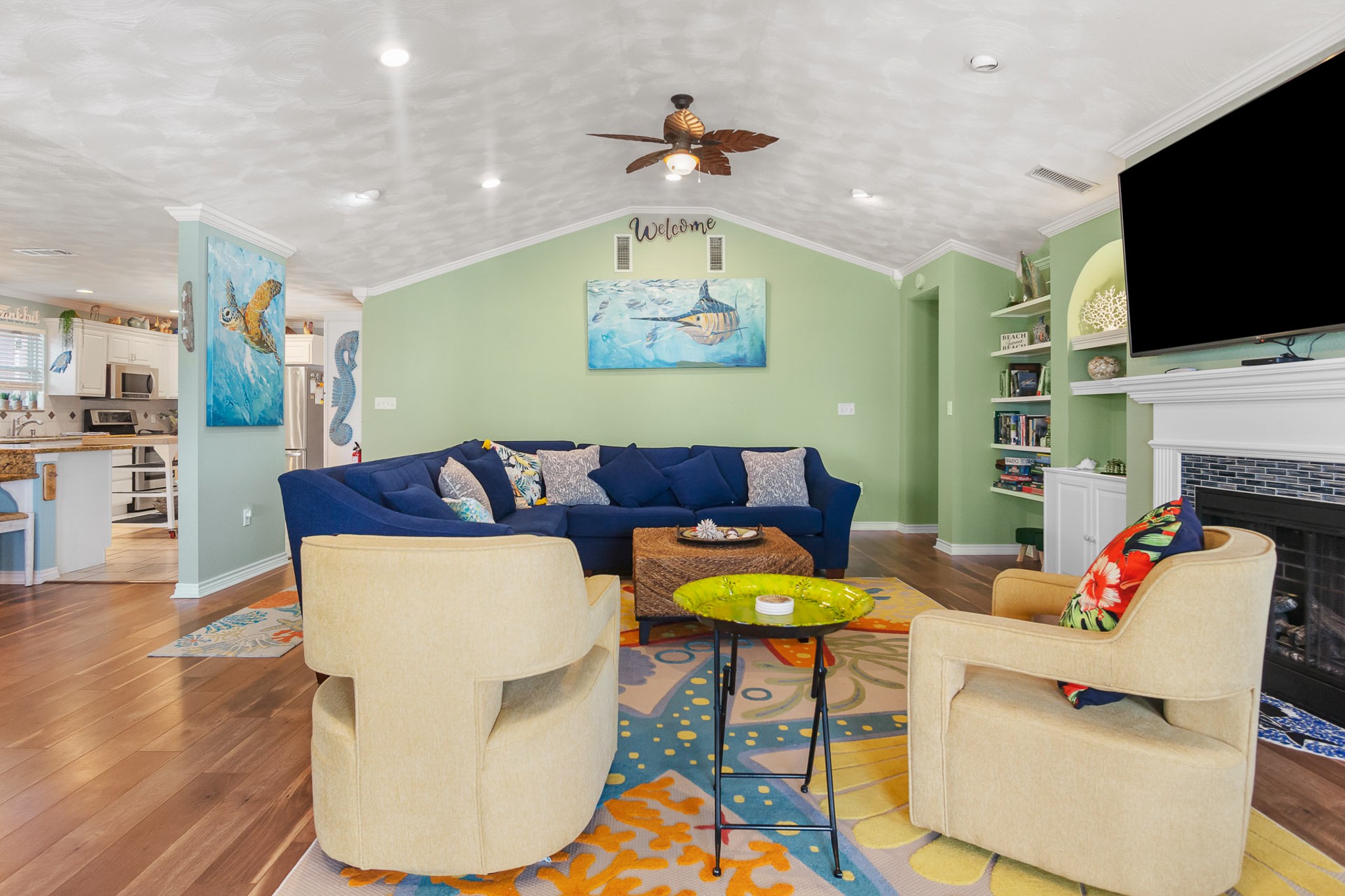3297 Prides Way Crystal Beach, TX 77650 - Photo 10 of 42 a living room with fireplace furniture and a flat screen tv