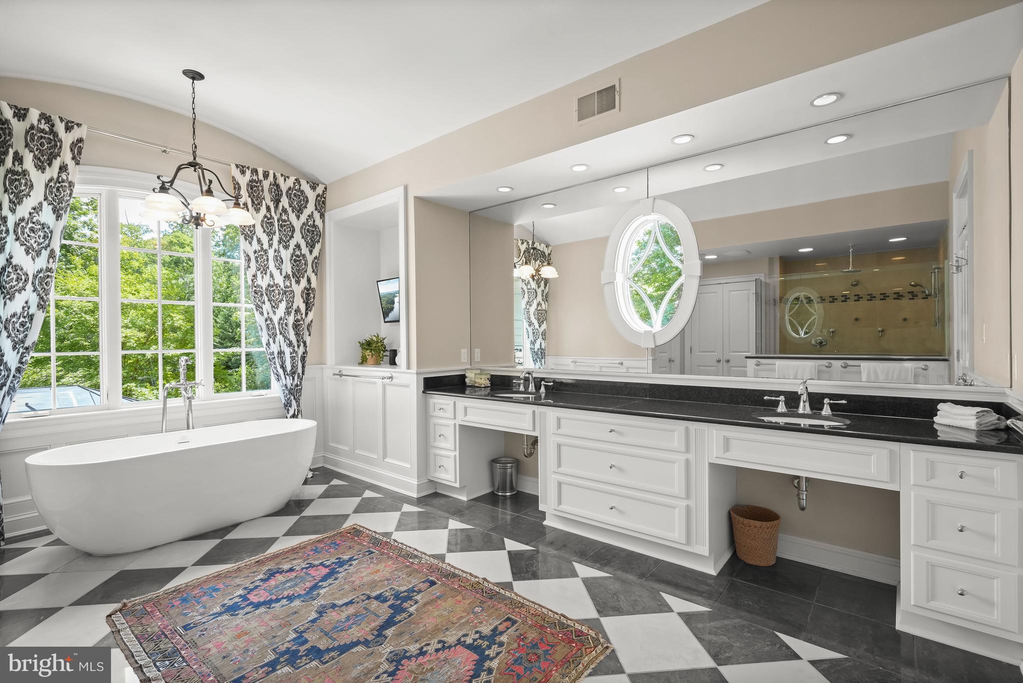 9908 Newhall Road Potomac, MD 20854 - Photo 20 of 44 Primary Bathroom with Built-Ins and Soaking Tub