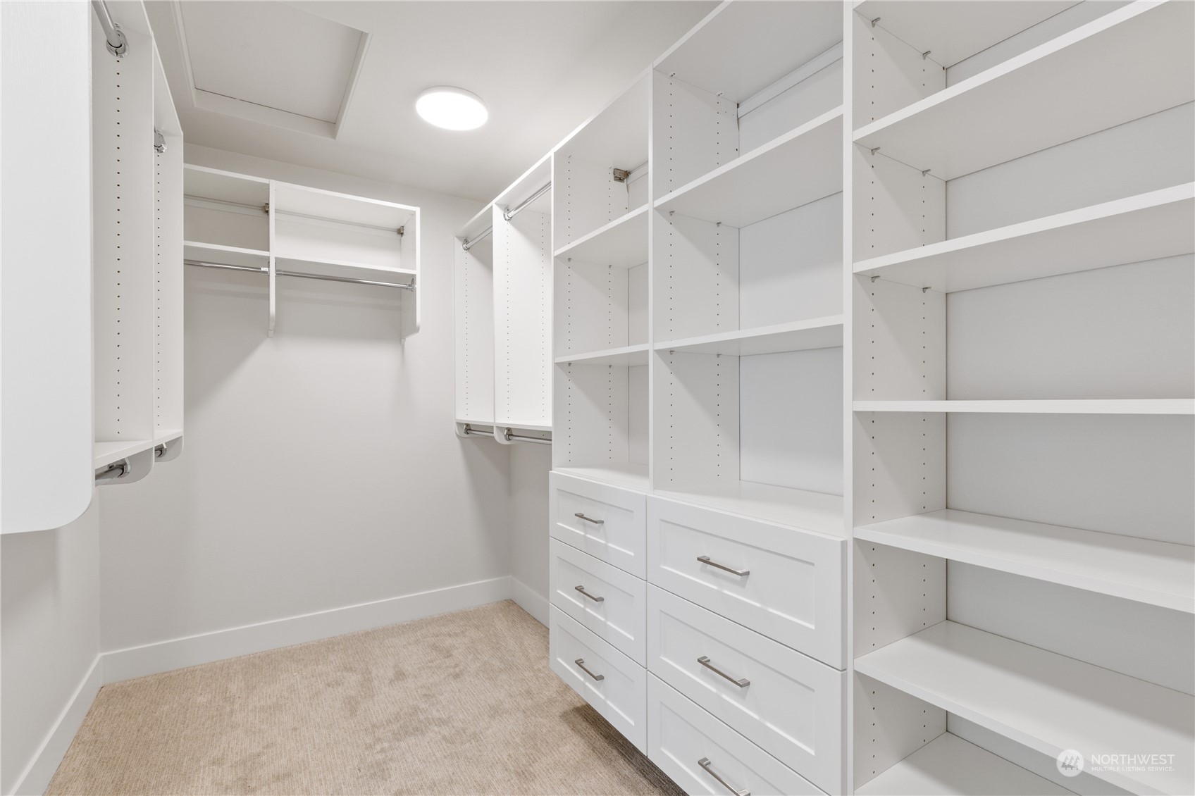 2421 242nd Place Southeast, Unit 9 Bothell, WA 98021 - Photo 12 of 15 a view of an empty walk in closet
