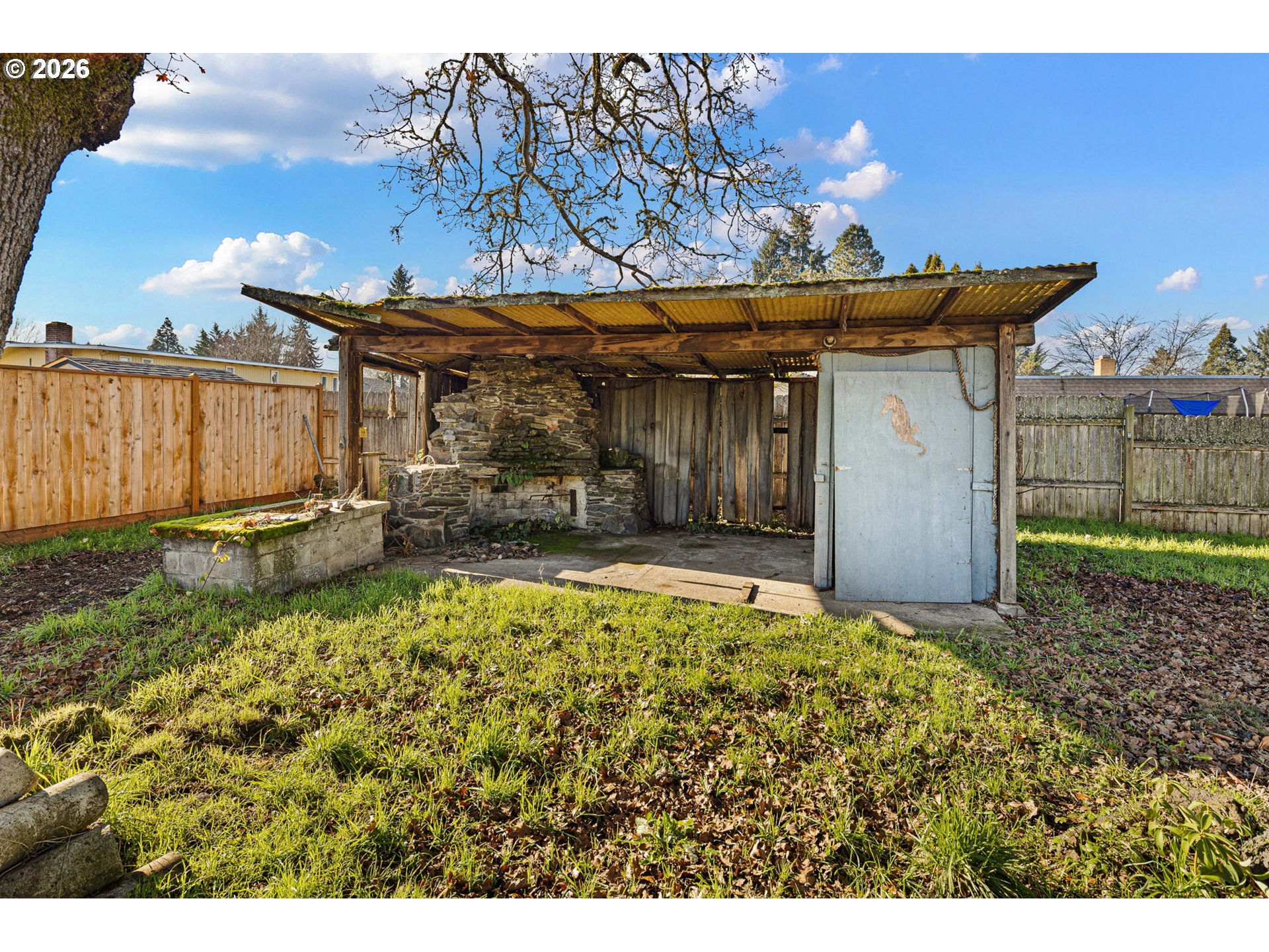 450-2 450-2 Eugene, OR 97404 - Photo 3 of 5 a view of a backyard with table and chairs
