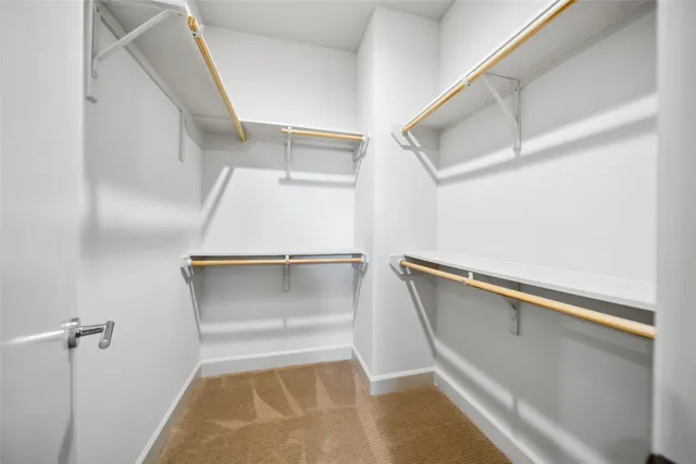 a bathroom with a sink a mirror and a shower