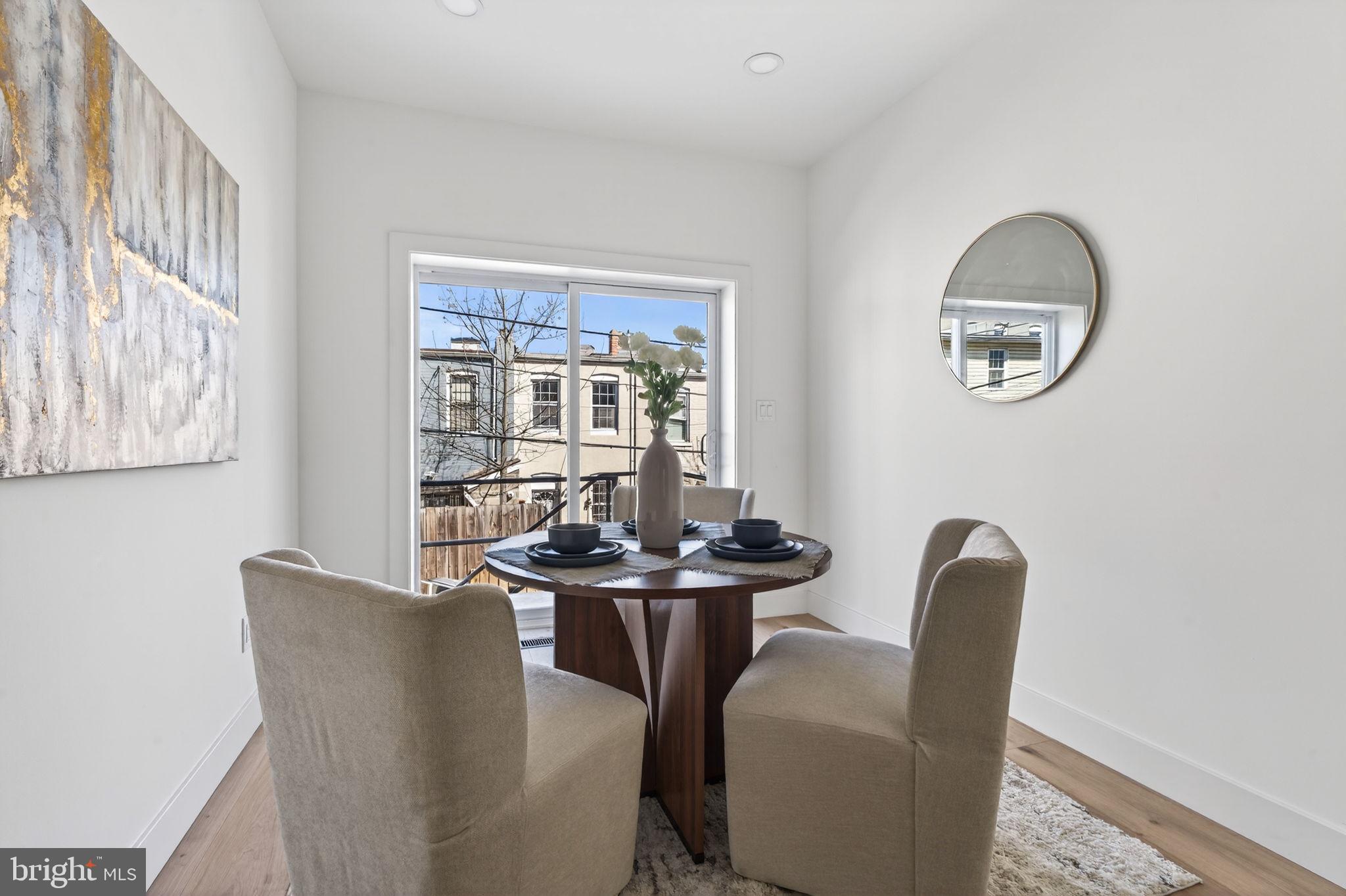 609 Harvard Street Northwest Washington, DC 20001 - Photo 14 of 41 a dining room with furniture and window