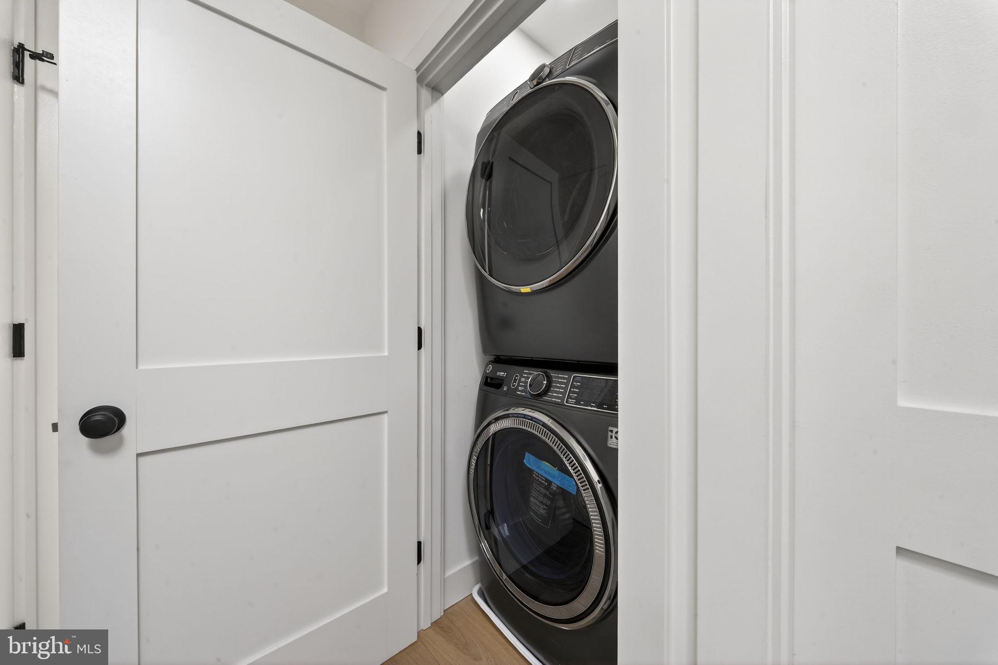 609 Harvard Street Northwest Washington, DC 20001 - Photo 27 of 41 a utility room with dryer and washer