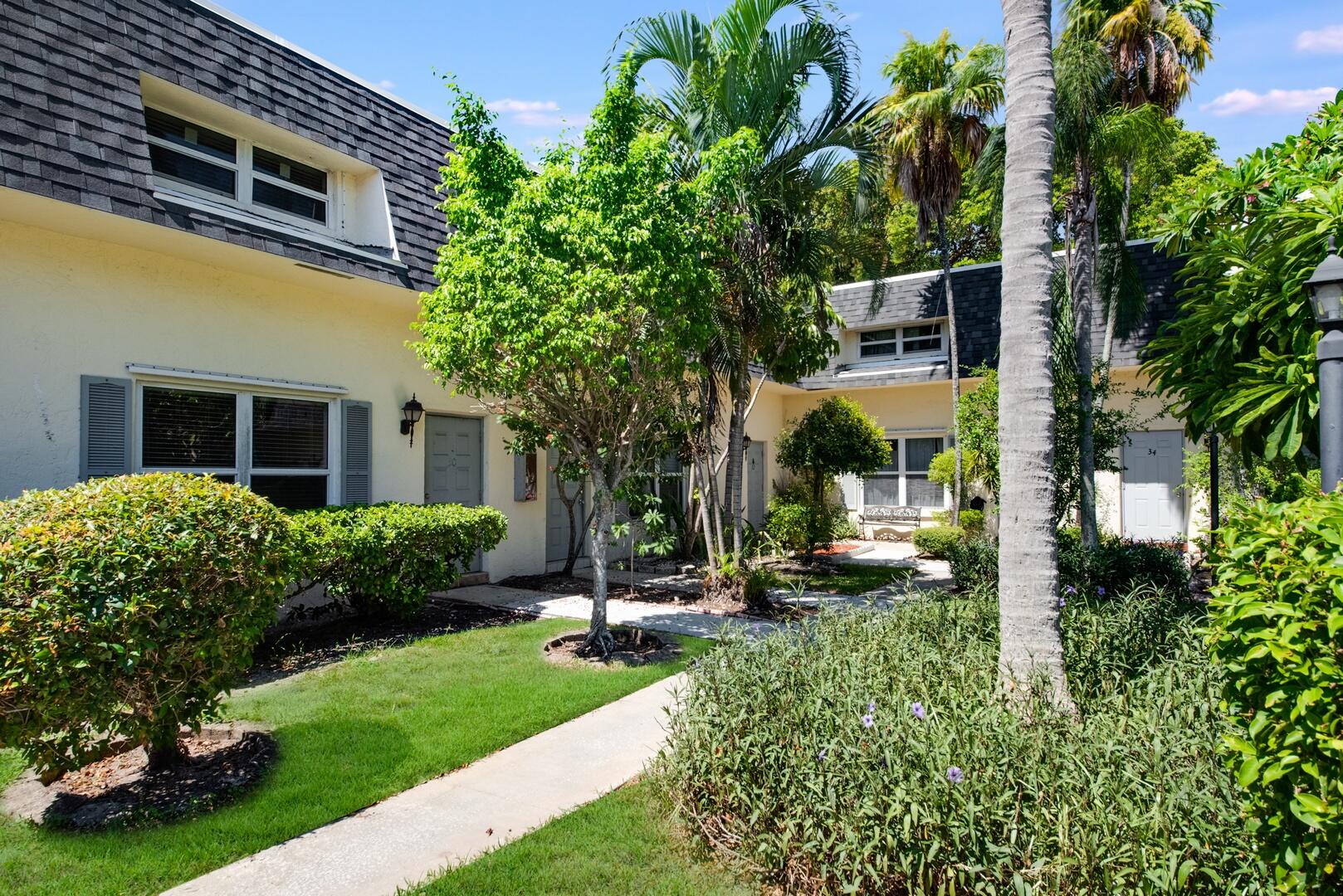 a view of a building with a yard