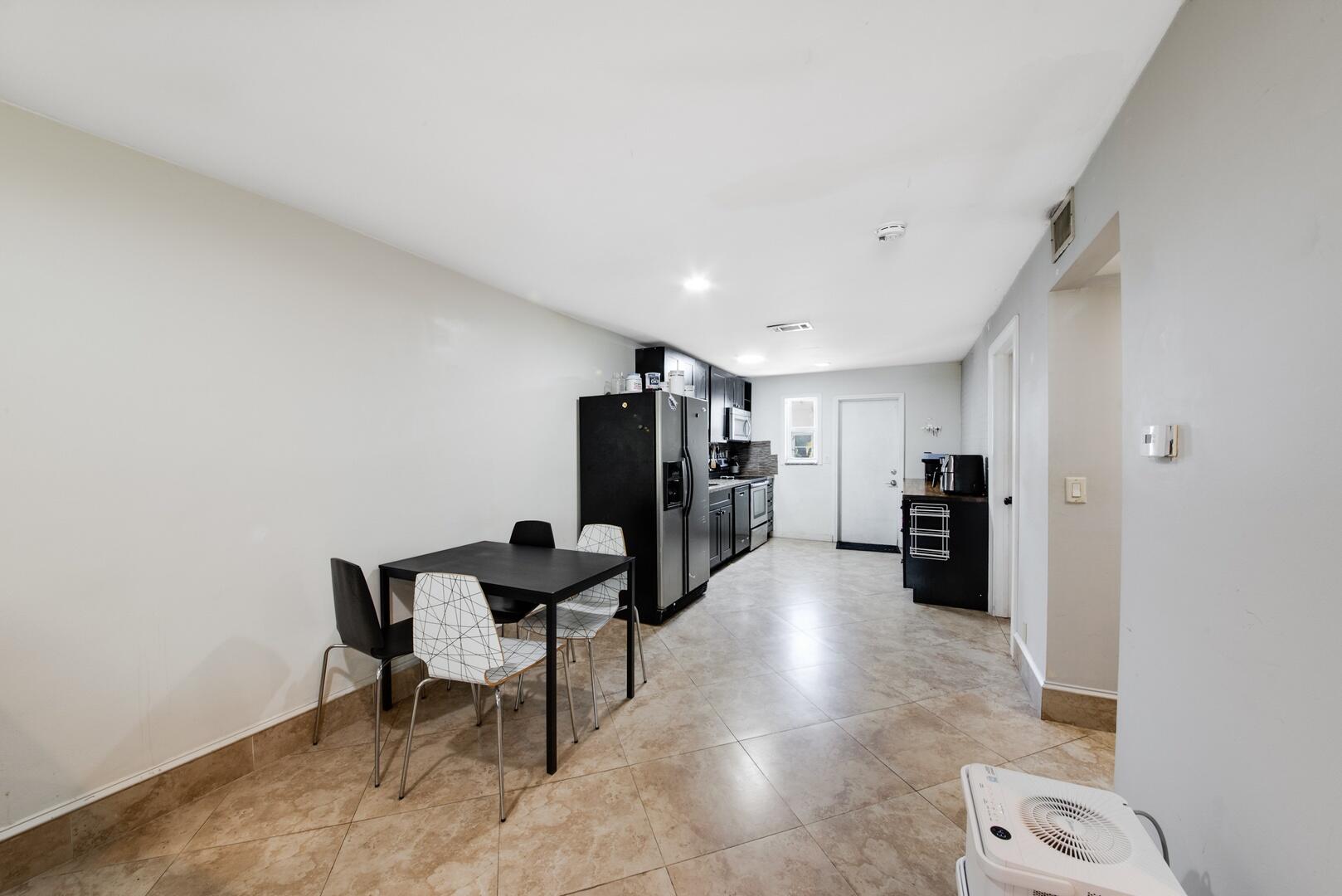 1945 Northwest 4th Avenue, Unit 30 Boca Raton, FL 33432 - Photo 12 of 30 a view of a hallway with seating area