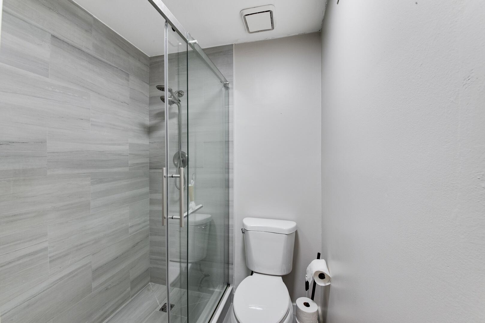 1945 Northwest 4th Avenue, Unit 30 Boca Raton, FL 33432 - Photo 25 of 30 a bathroom with a toilet and a shower