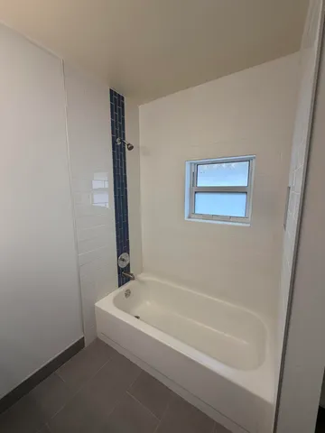 a bathroom with a bathtub