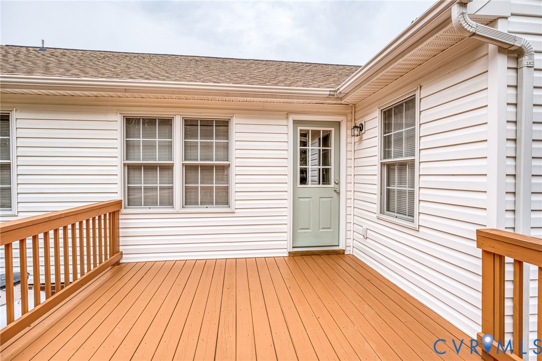 7045 Tranquility Lane Sutherland, VA 23885 - Photo 22 of 27 a view of a house with a deck
