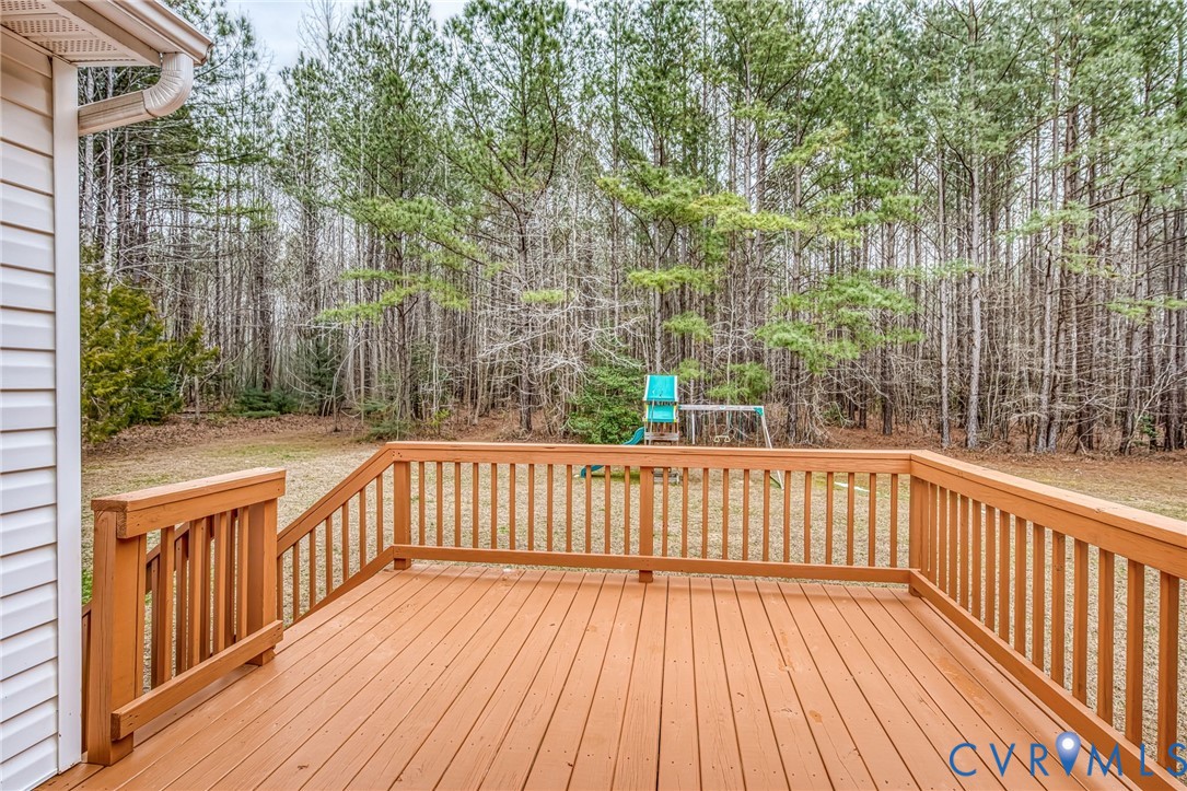7045 Tranquility Lane Sutherland, VA 23885 - Photo 23 of 27 a view of balcony with wooden floor