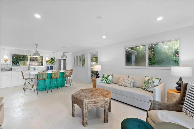 a living room with furniture and a table