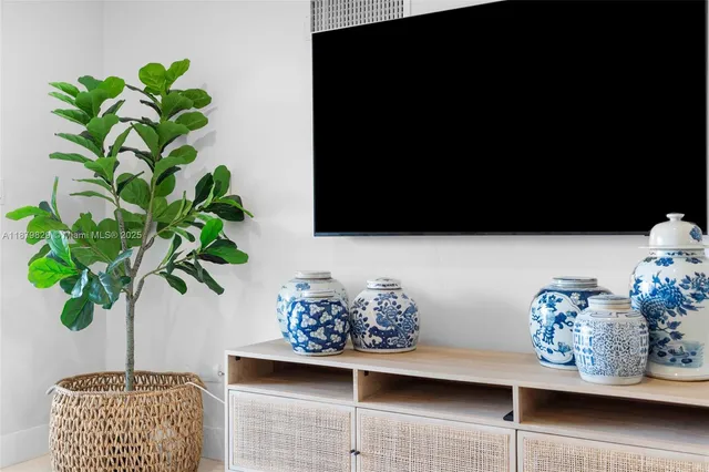 a vase of flowers sitting on a table