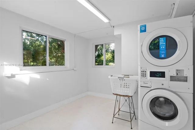 a view of livingroom with washer and dryer