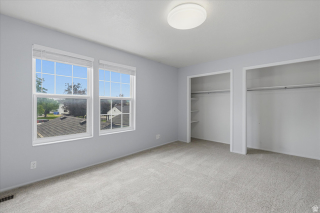 187 West 1190th Street North Logan, UT 84341 - Photo 6 of 12 Master bedroom with double closet and ample natural lighting