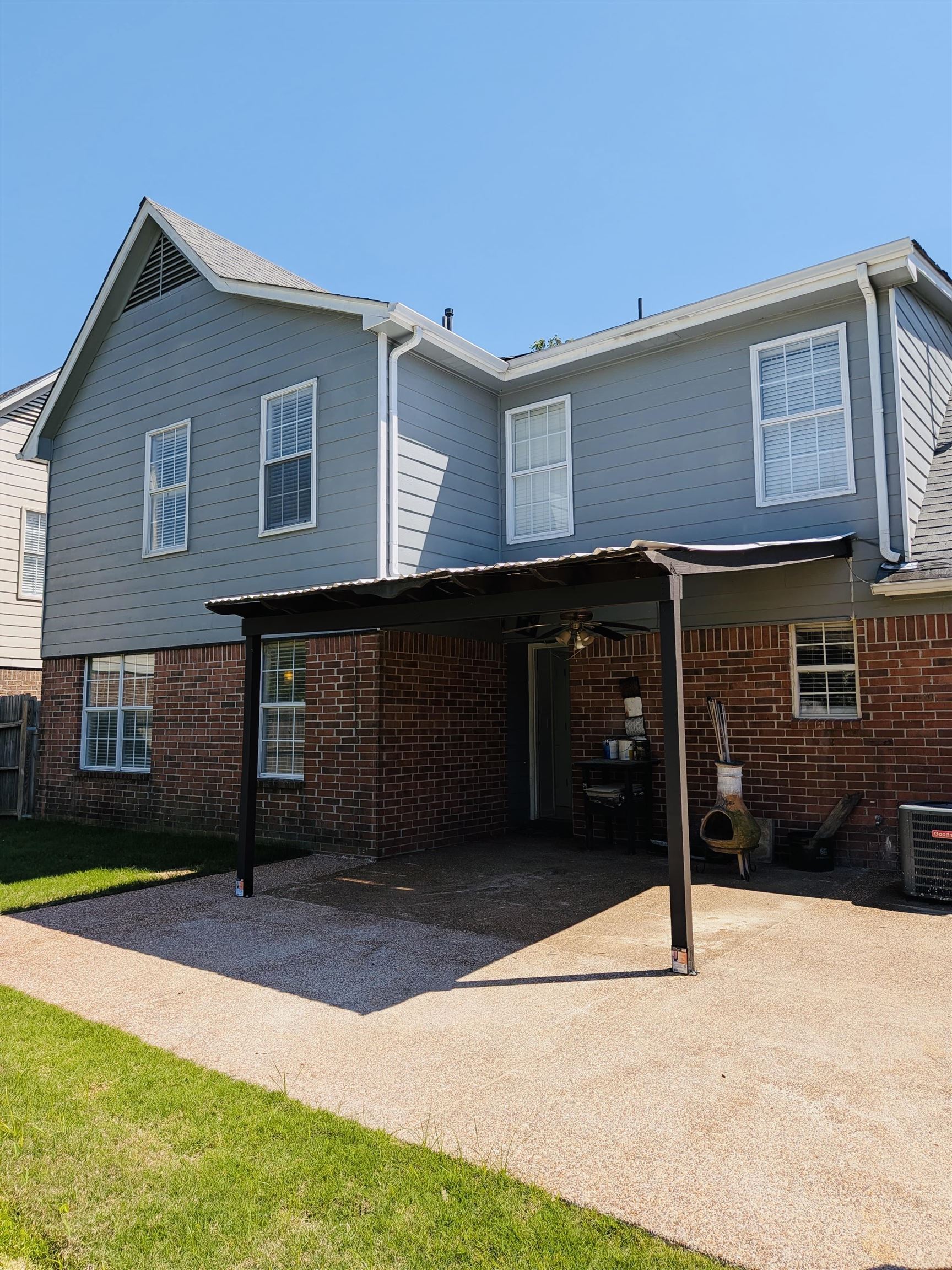 10006 Cameron Ridge Trail Memphis, TN 38016 - Photo 26 of 29 a front view of a house with a yard