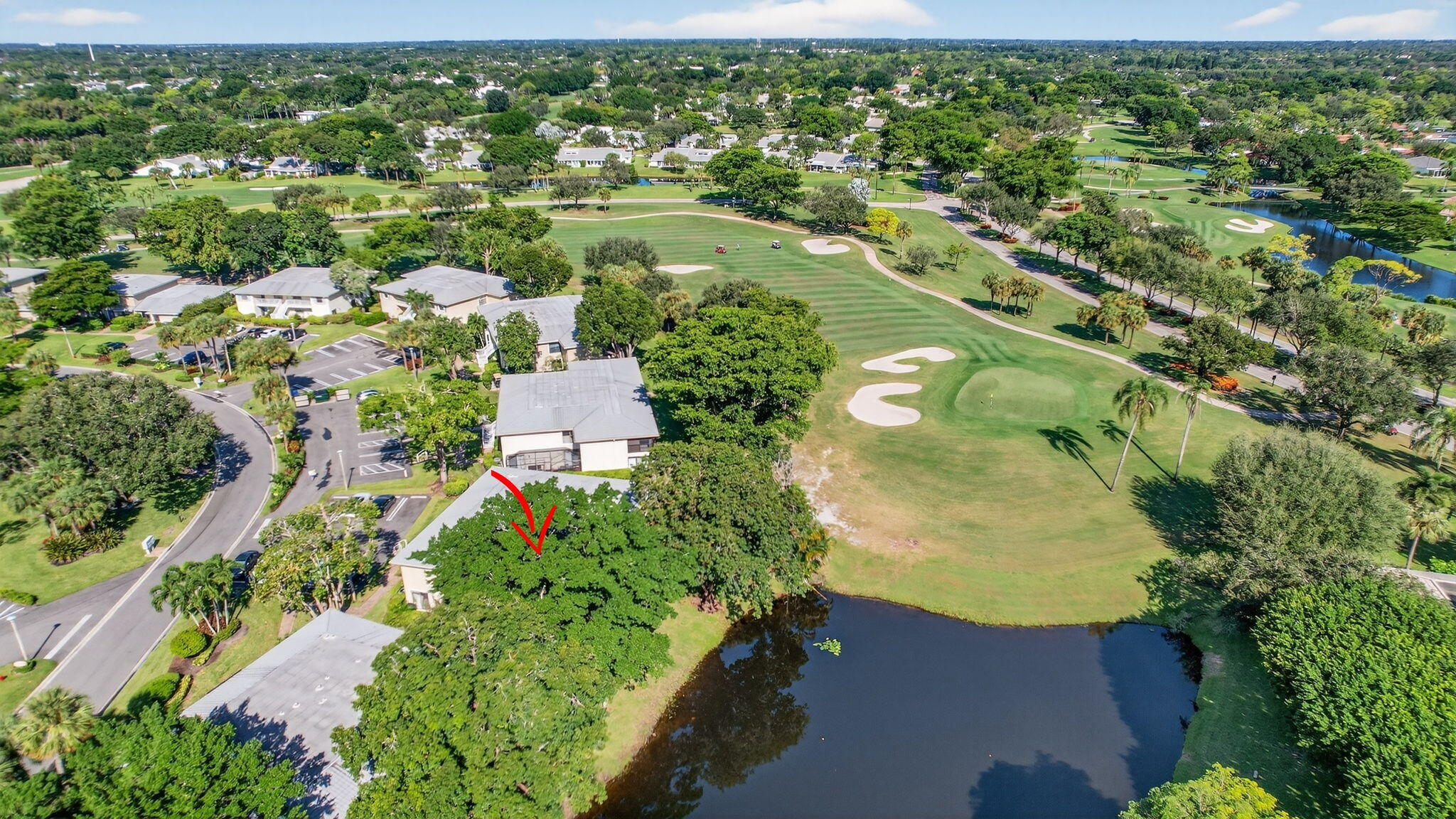 3 Westgate Lane, Unit C Boynton Beach, FL 33436 - Photo 47 of 98 an aerial view of residential houses with outdoor space and trees all around