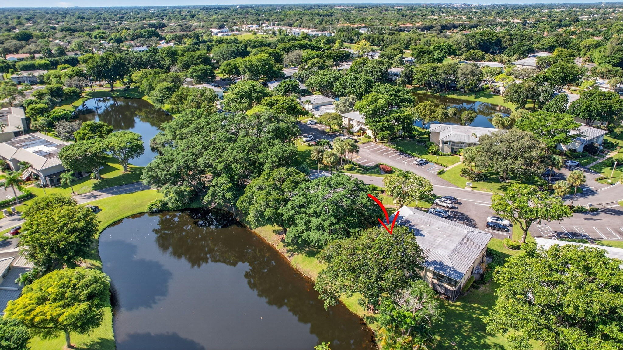 3 Westgate Lane, Unit C Boynton Beach, FL 33436 - Photo 50 of 98 an aerial view of residential house with outdoor space and trees all around