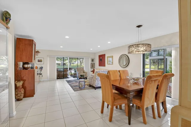 a outdoor dining space with furniture and garden view