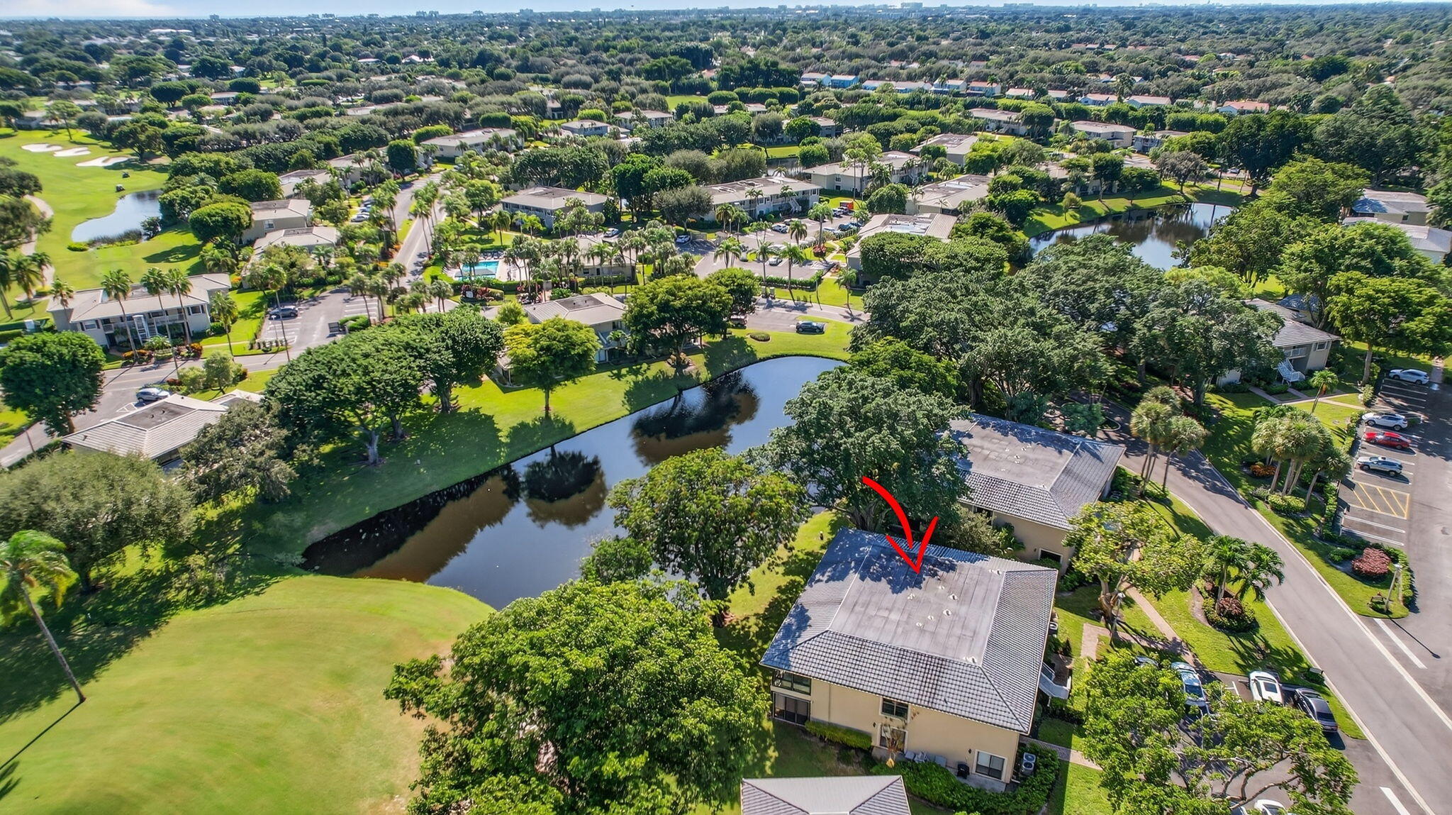 3 Westgate Lane, Unit C Boynton Beach, FL 33436 - Photo 51 of 98 an aerial view of residential houses with outdoor space and trees