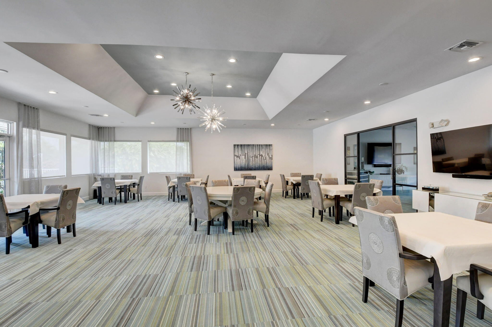 3 Westgate Lane, Unit C Boynton Beach, FL 33436 - Photo 60 of 98 a view of a dining room with furniture window and wooden floor